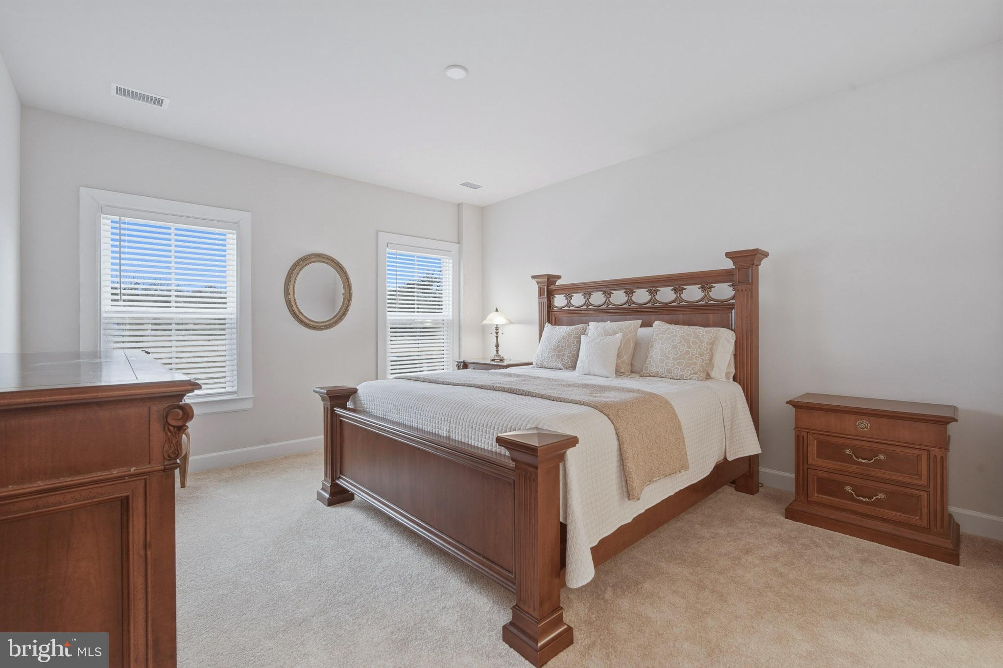 303 Southgate Road Cape May Court House, NJ 08210 - Photo 9 of 25 a bedroom with a bed and a dresser