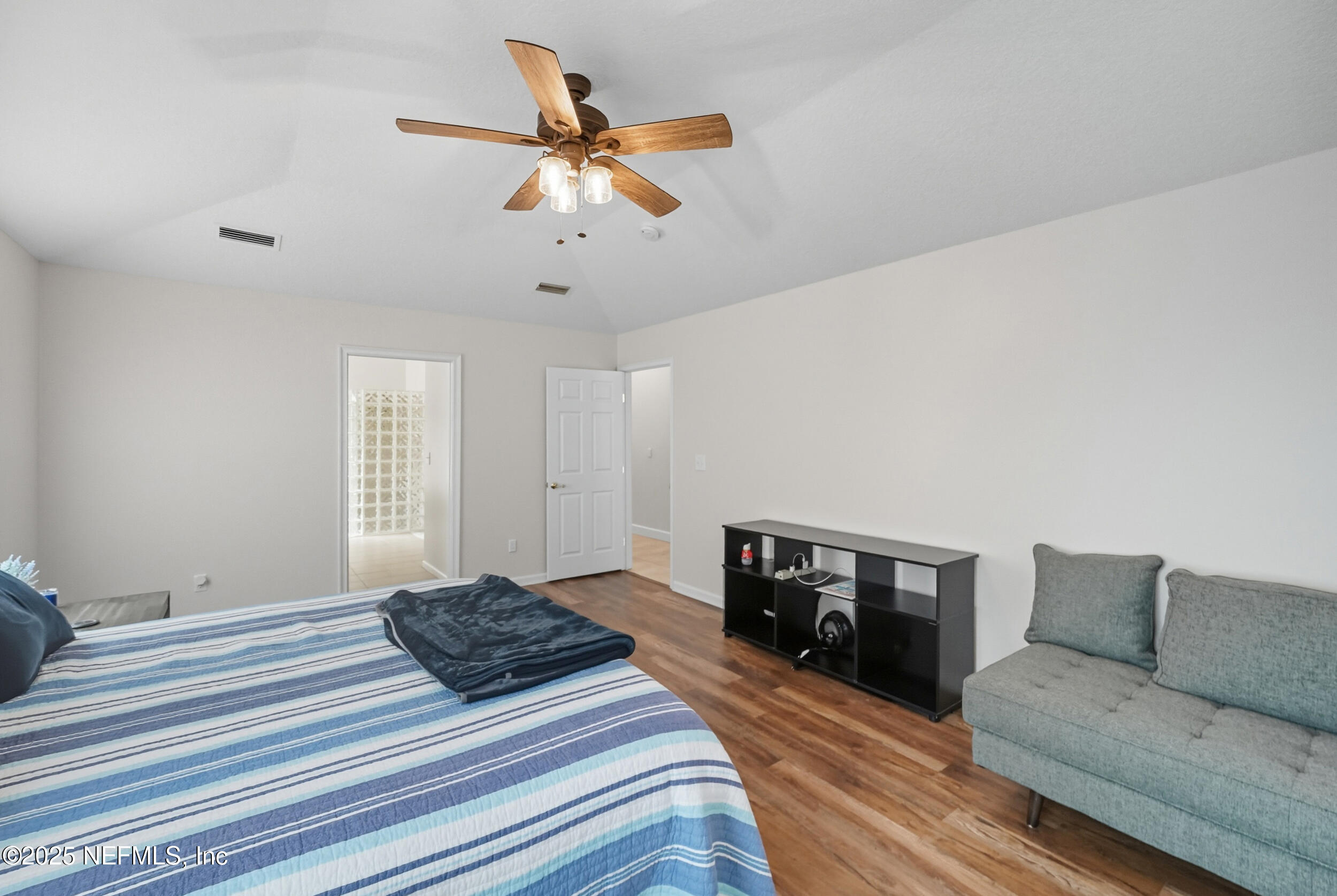 3761 Golden Reeds Lane Jacksonville, FL 32224 - Photo 14 of 40 a bedroom with bed and window