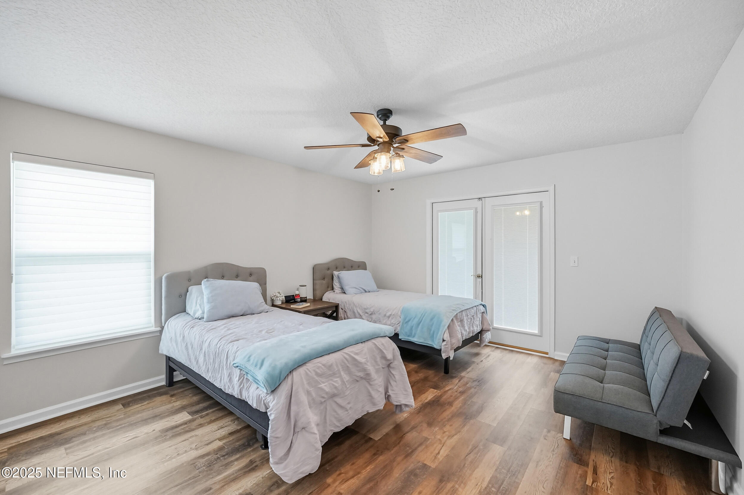 3761 Golden Reeds Lane Jacksonville, FL 32224 - Photo 21 of 40 a bedroom with bed and window