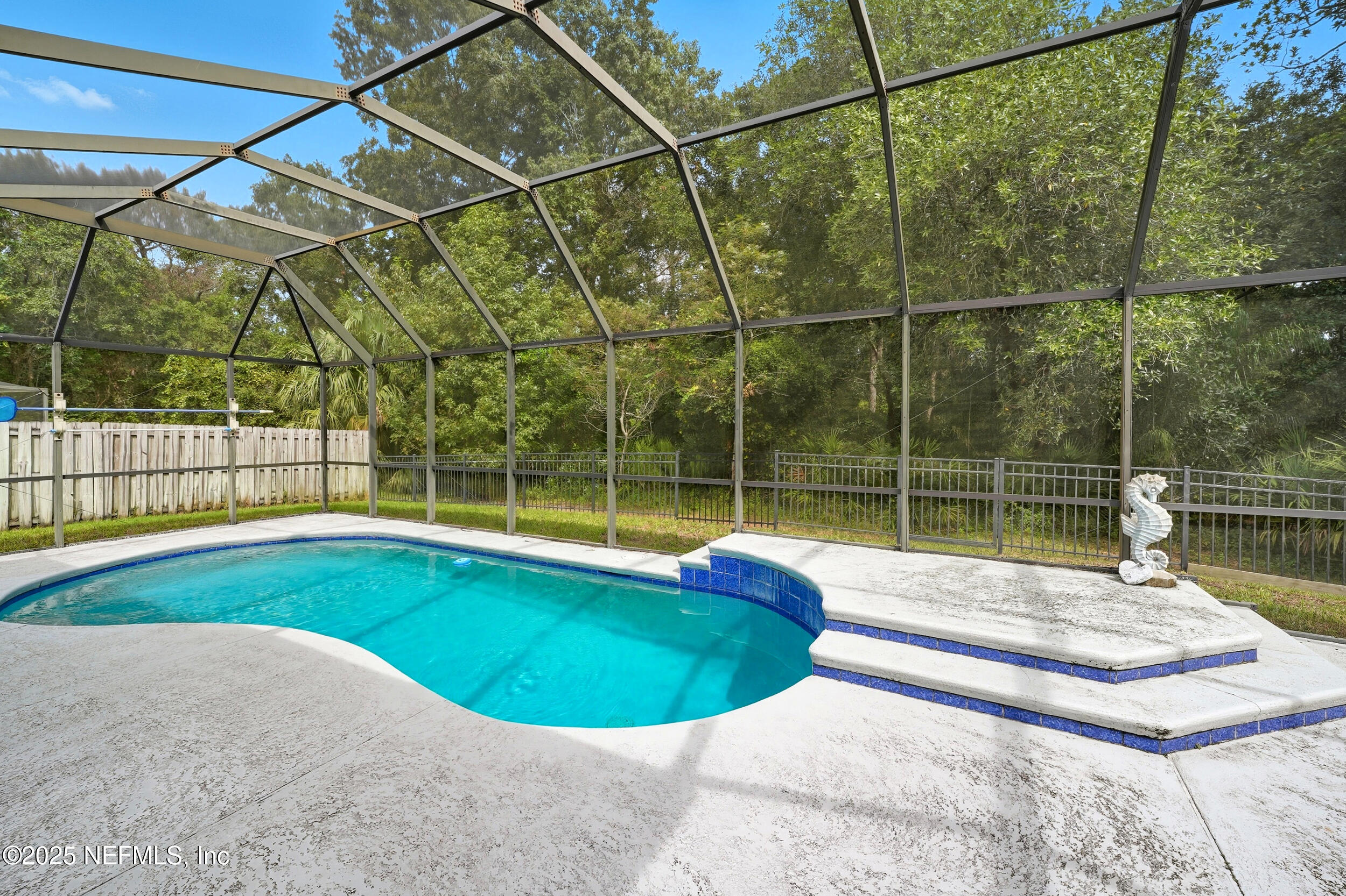 3761 Golden Reeds Lane Jacksonville, FL 32224 - Photo 28 of 40 a view of a house with a swimming pool