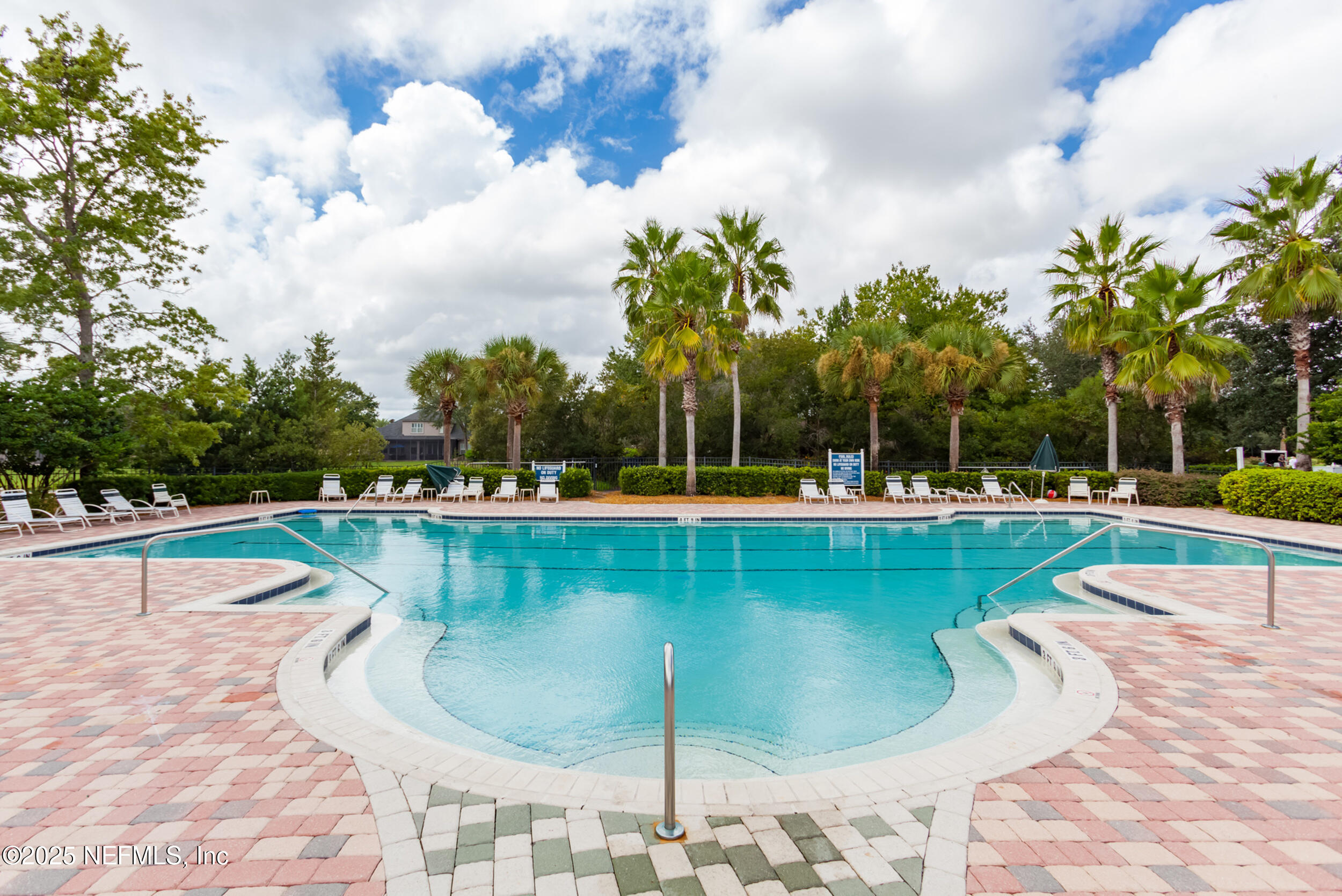 3761 Golden Reeds Lane Jacksonville, FL 32224 - Photo 33 of 40 a view of a swimming pool with a patio
