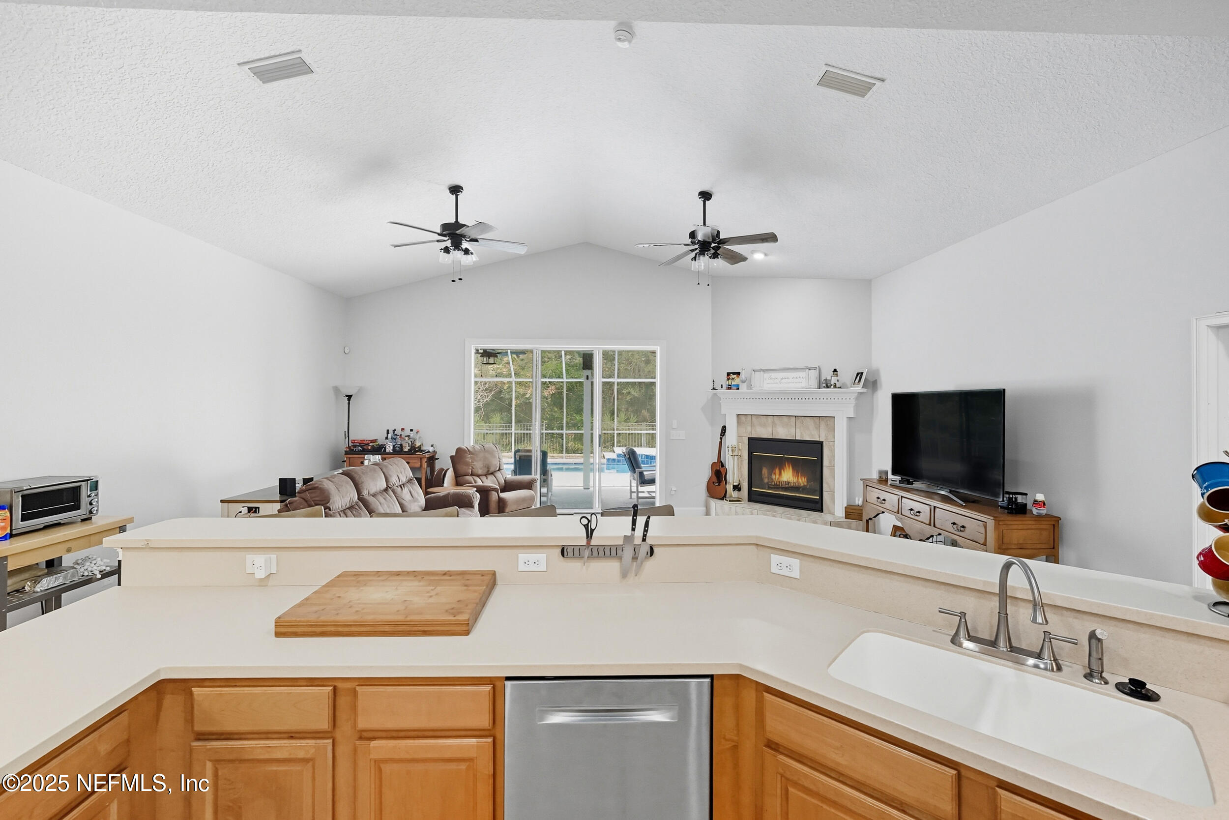 3761 Golden Reeds Lane Jacksonville, FL 32224 - Photo 8 of 40 a kitchen with a sink and a stove top oven