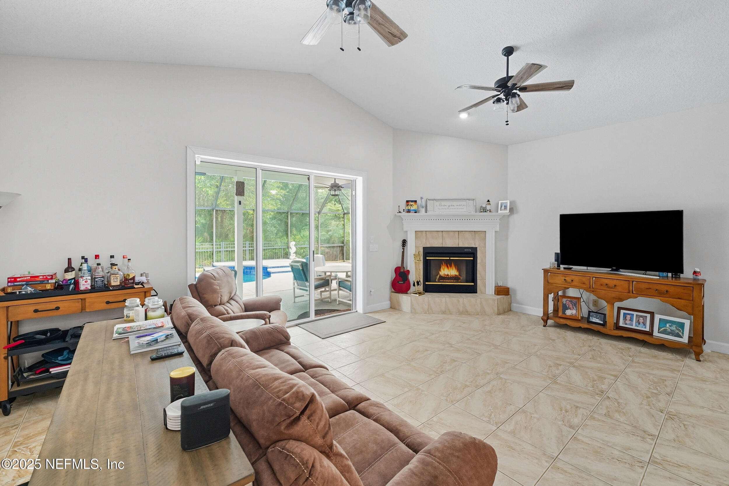 3761 Golden Reeds Lane Jacksonville, FL 32224 - Photo 10 of 40 a living room with furniture and a flat screen tv