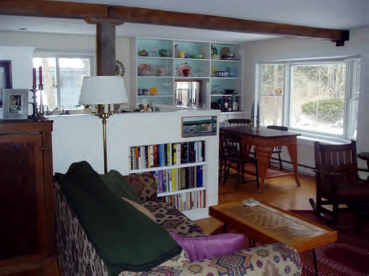 5 Christian Hill Road Stockbridge, MA 01262 - Photo 3 of 8 a living room with furniture a bookshelf and a window