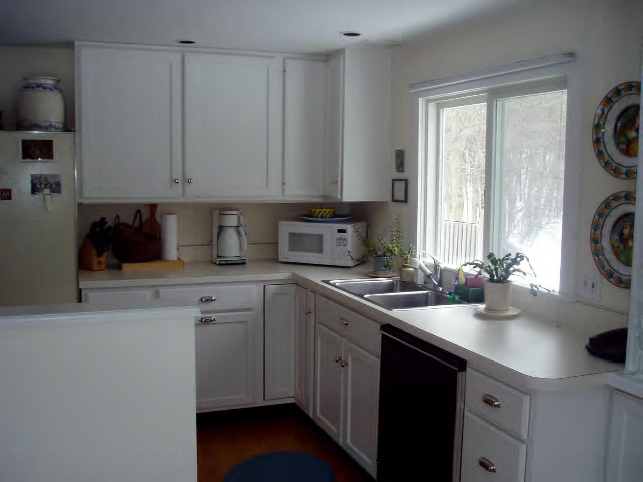 5 Christian Hill Road Stockbridge, MA 01262 - Photo 5 of 8 a kitchen with a sink a stove and cabinets