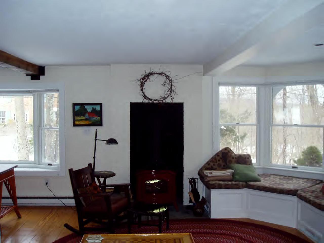 5 Christian Hill Road Stockbridge, MA 01262 - Photo 7 of 8 a living room with furniture a window and a flat screen tv