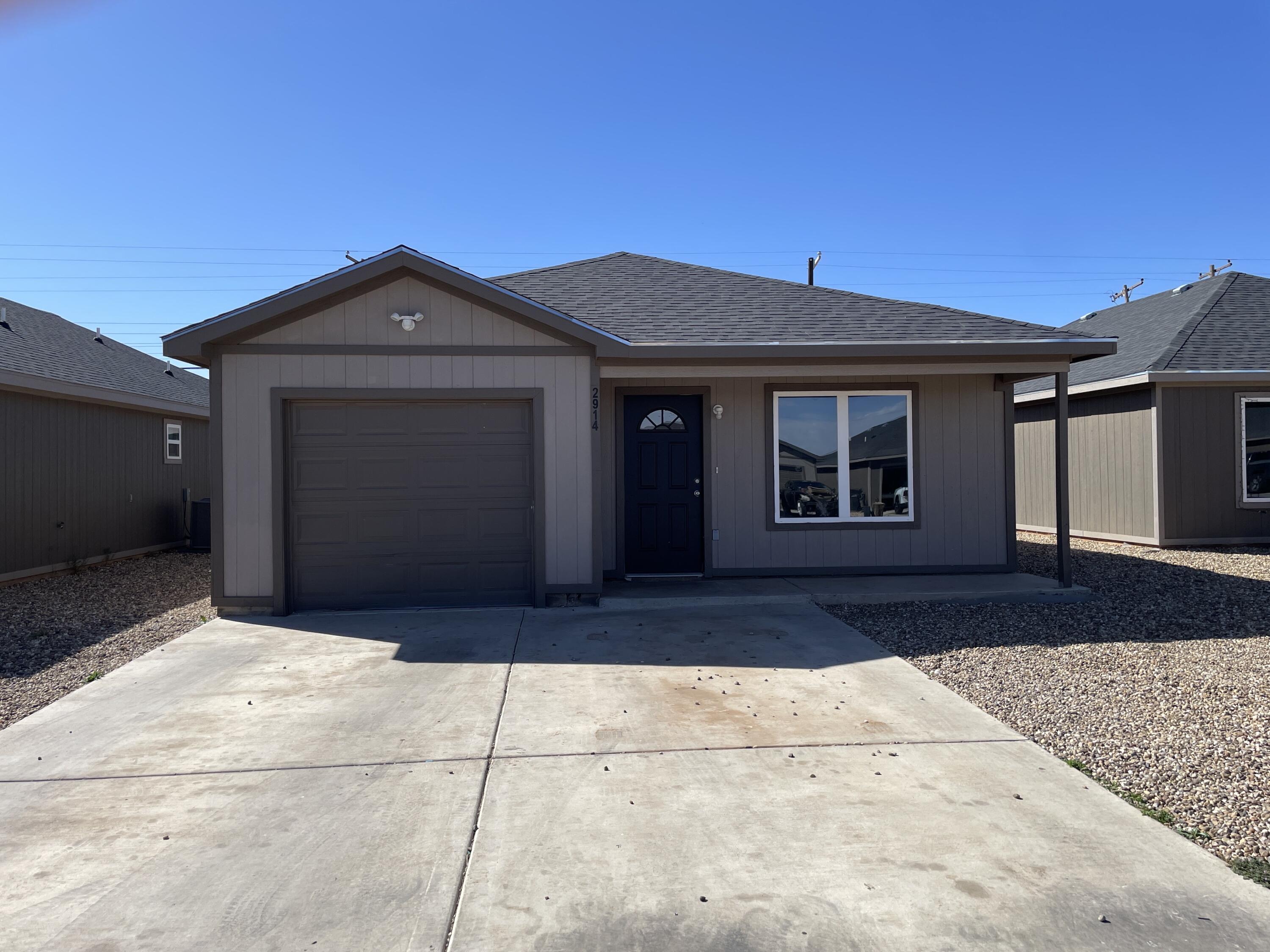 2914 East Cornell Street Lubbock, TX 79403 - Photo 1 of 18 a front view of a house