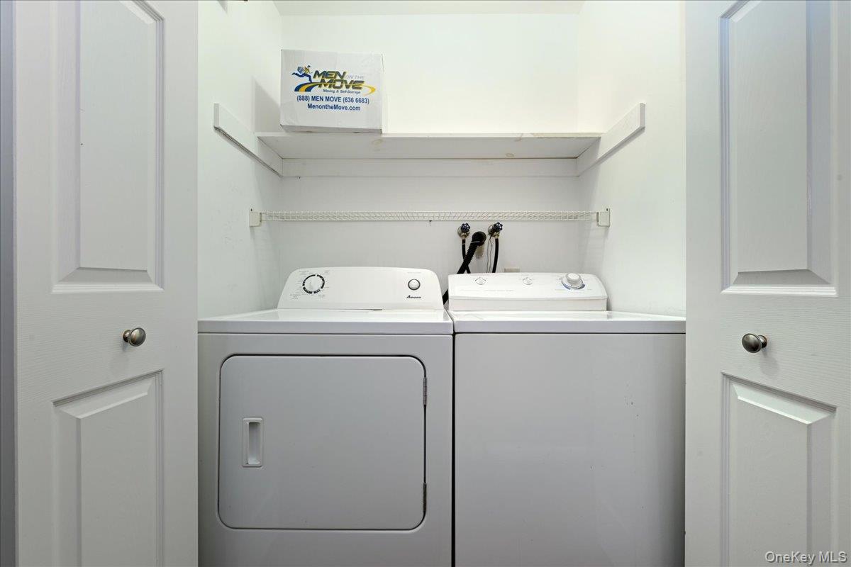 23 Sandy Hill Road Commack, NY 11725 - Photo 17 of 24 a utility room with dryer and washer