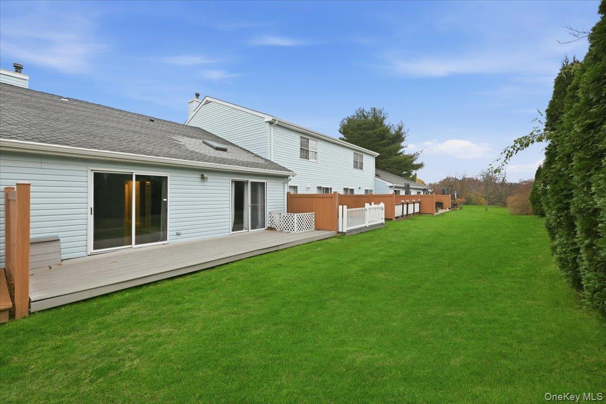 23 Sandy Hill Road Commack, NY 11725 - Photo 19 of 24 a front view of house with yard and green space
