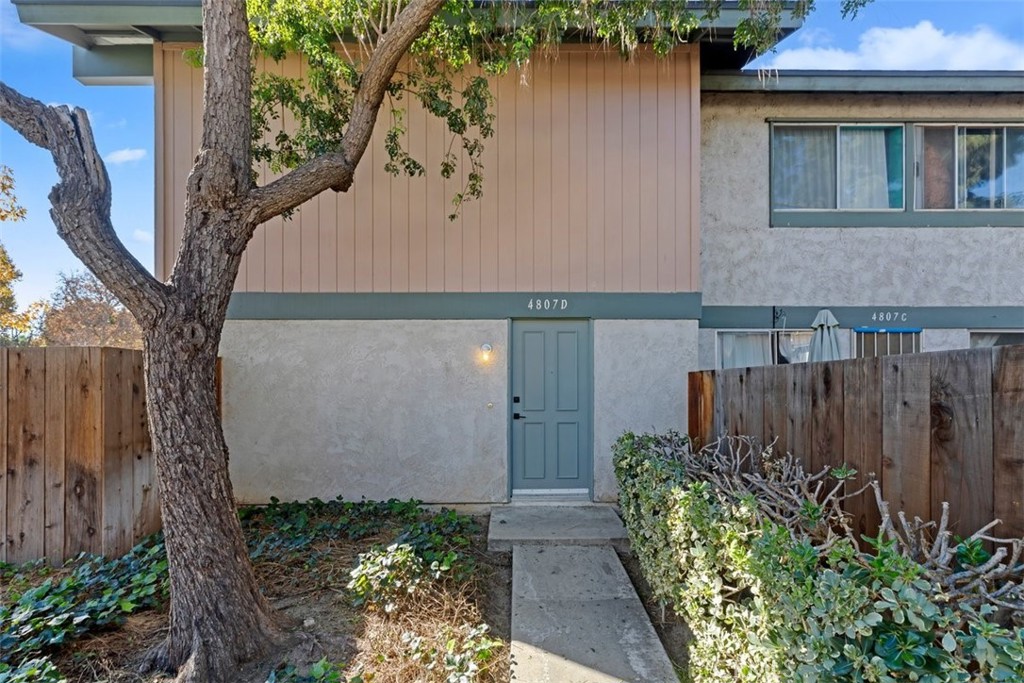 4807 Jackson Street, Unit D Riverside, CA 92503 - Photo 13 of 38 a front view of a house with garden