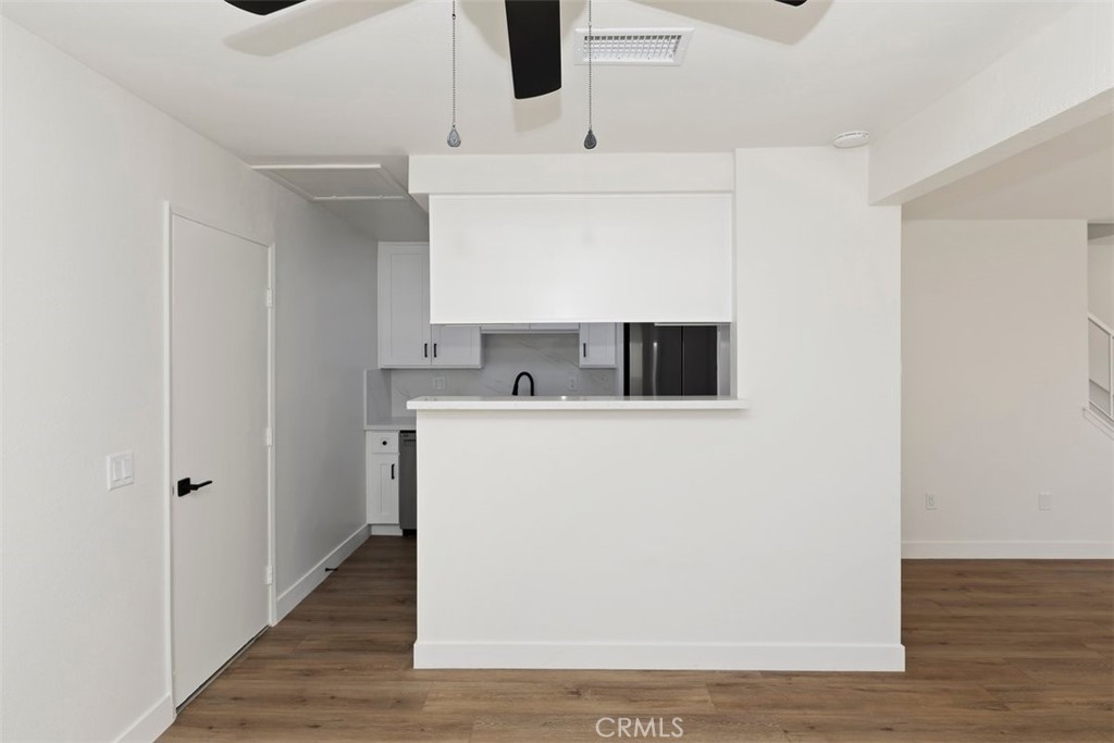 4807 Jackson Street, Unit D Riverside, CA 92503 - Photo 14 of 38 a utility room with cabinets washer and dryer