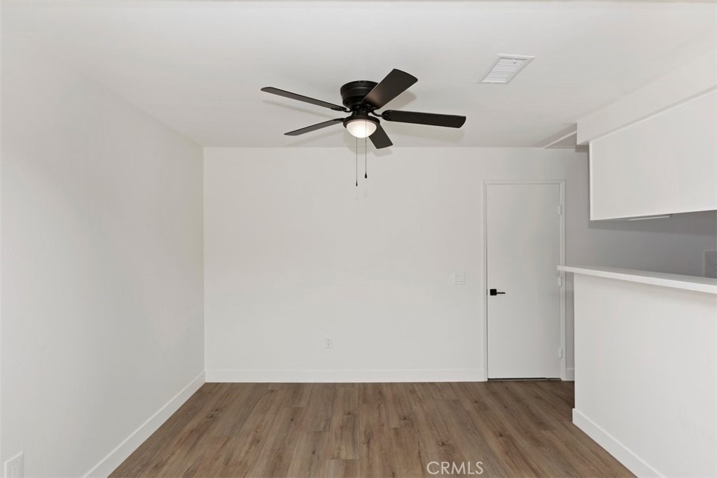 4807 Jackson Street, Unit D Riverside, CA 92503 - Photo 15 of 38 a view of a room with wooden floor