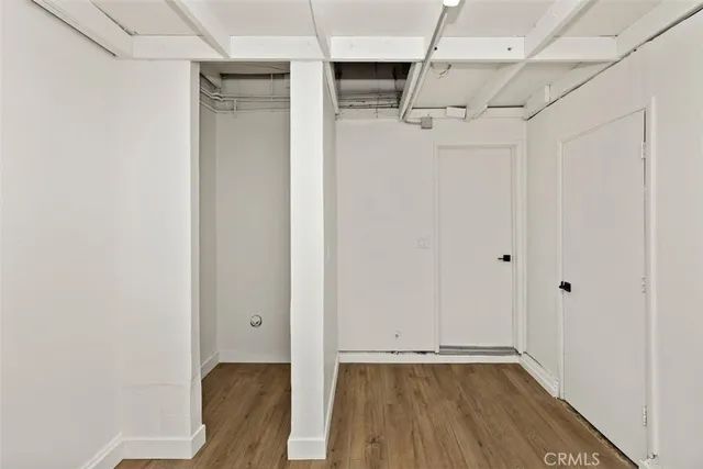 a view of small space with wooden floor