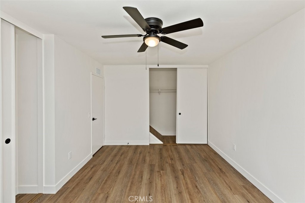 4807 Jackson Street, Unit D Riverside, CA 92503 - Photo 25 of 38 a view of empty room with wooden floor