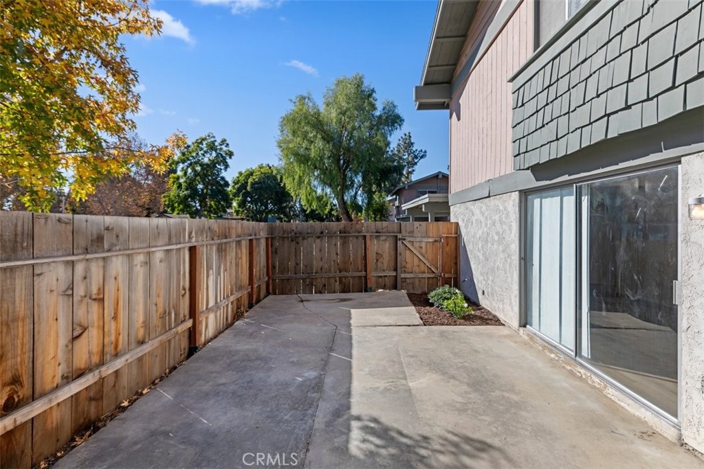4807 Jackson Street, Unit D Riverside, CA 92503 - Photo 29 of 38 a view of garden with wooden fence