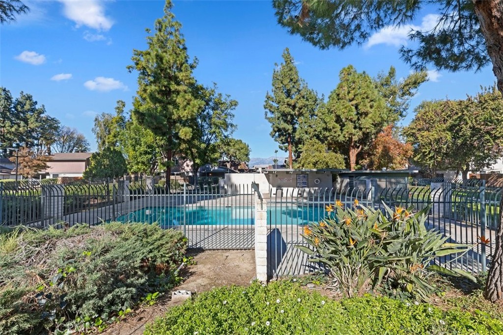 4807 Jackson Street, Unit D Riverside, CA 92503 - Photo 32 of 38 a view of a bench in the garden