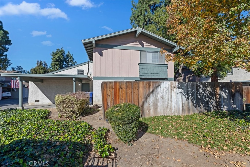 4807 Jackson Street, Unit D Riverside, CA 92503 - Photo 34 of 38 a front view of a house with garden