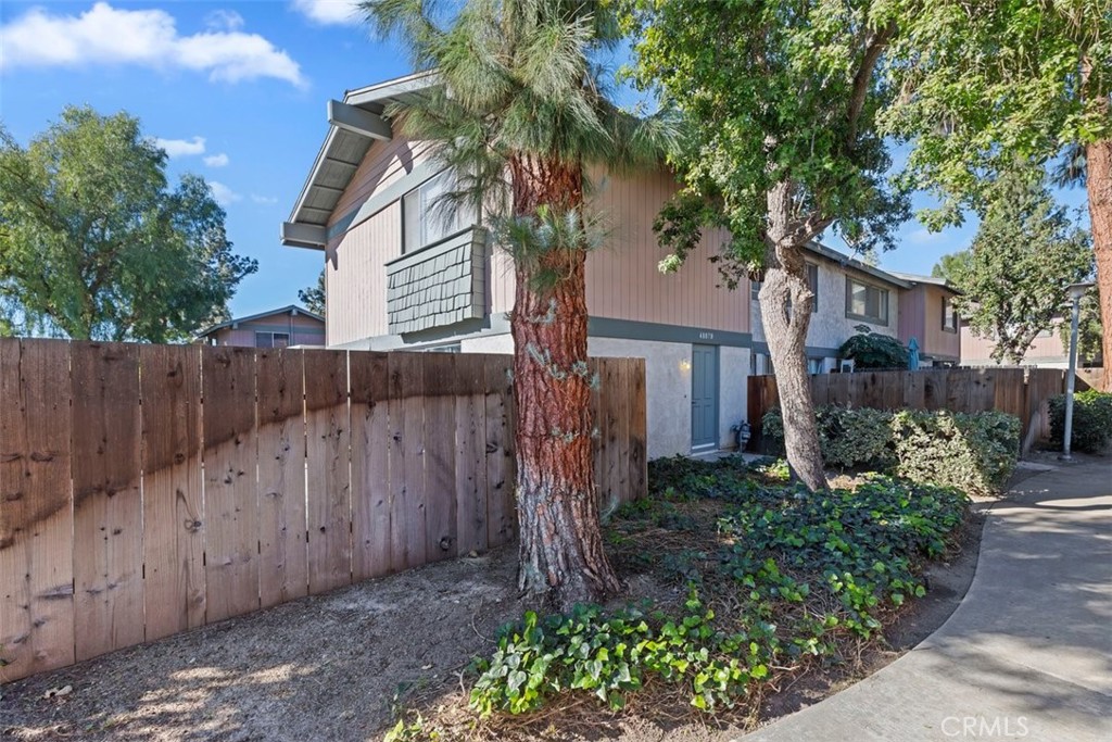 4807 Jackson Street, Unit D Riverside, CA 92503 - Photo 36 of 38 a front view of a house with garden