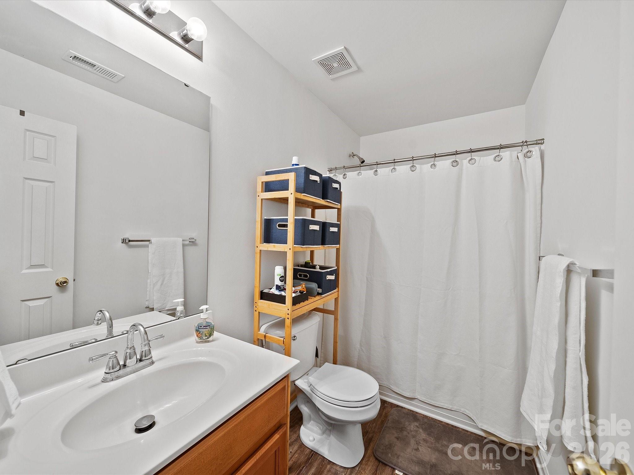 2306 Nettleton Court Matthews, NC 28105 - Photo 26 of 34 a bathroom with a sink toilet and shower