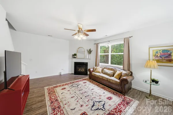 a bathroom with a sink a mirror and a toilet