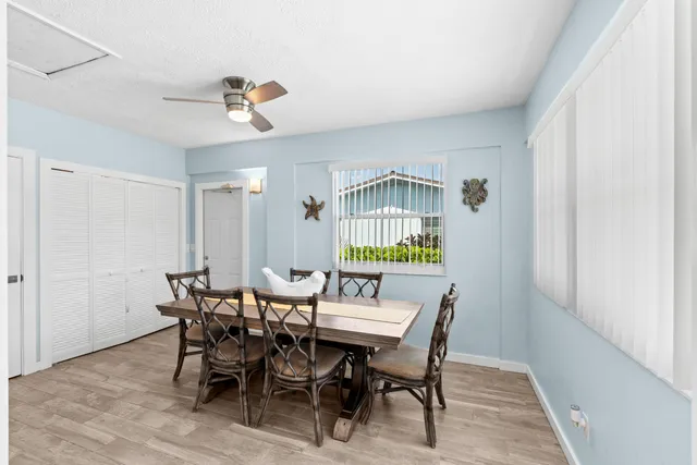 a kitchen with stainless steel appliances granite countertop a refrigerator sink and cabinets