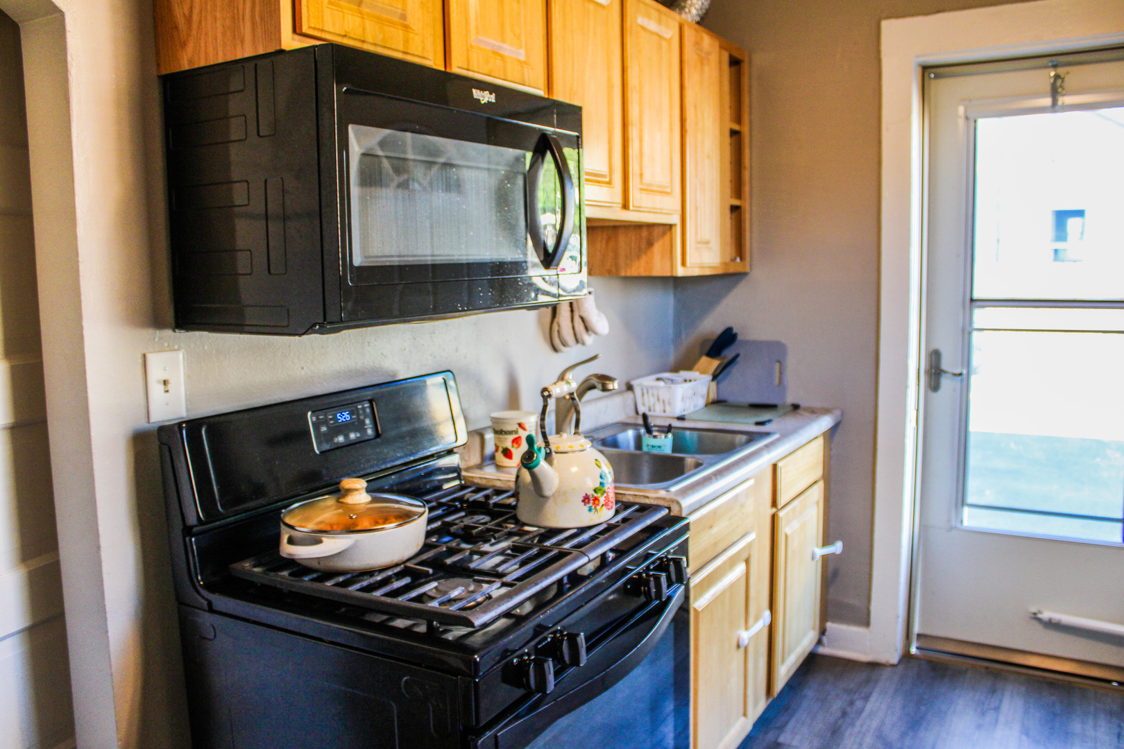 109 Cary Street Cary, IL 60013 - Photo 12 of 21 a kitchen with a stove and a microwave