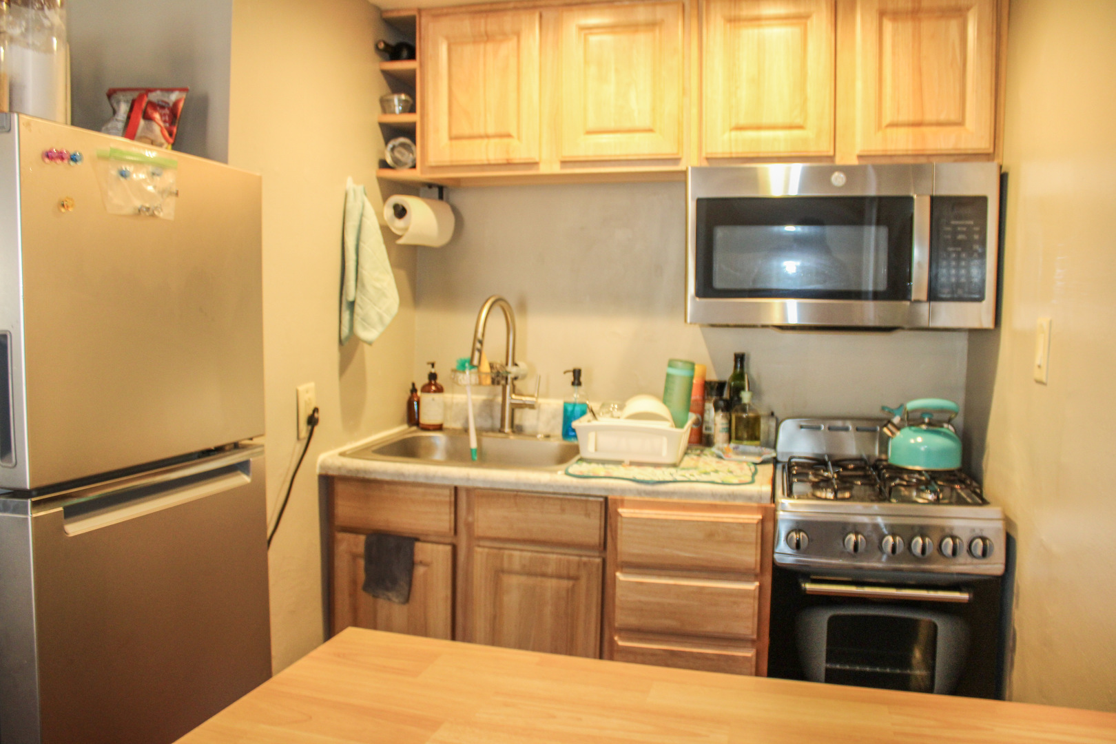 109 Cary Street Cary, IL 60013 - Photo 15 of 21 a kitchen with a stove and a microwave