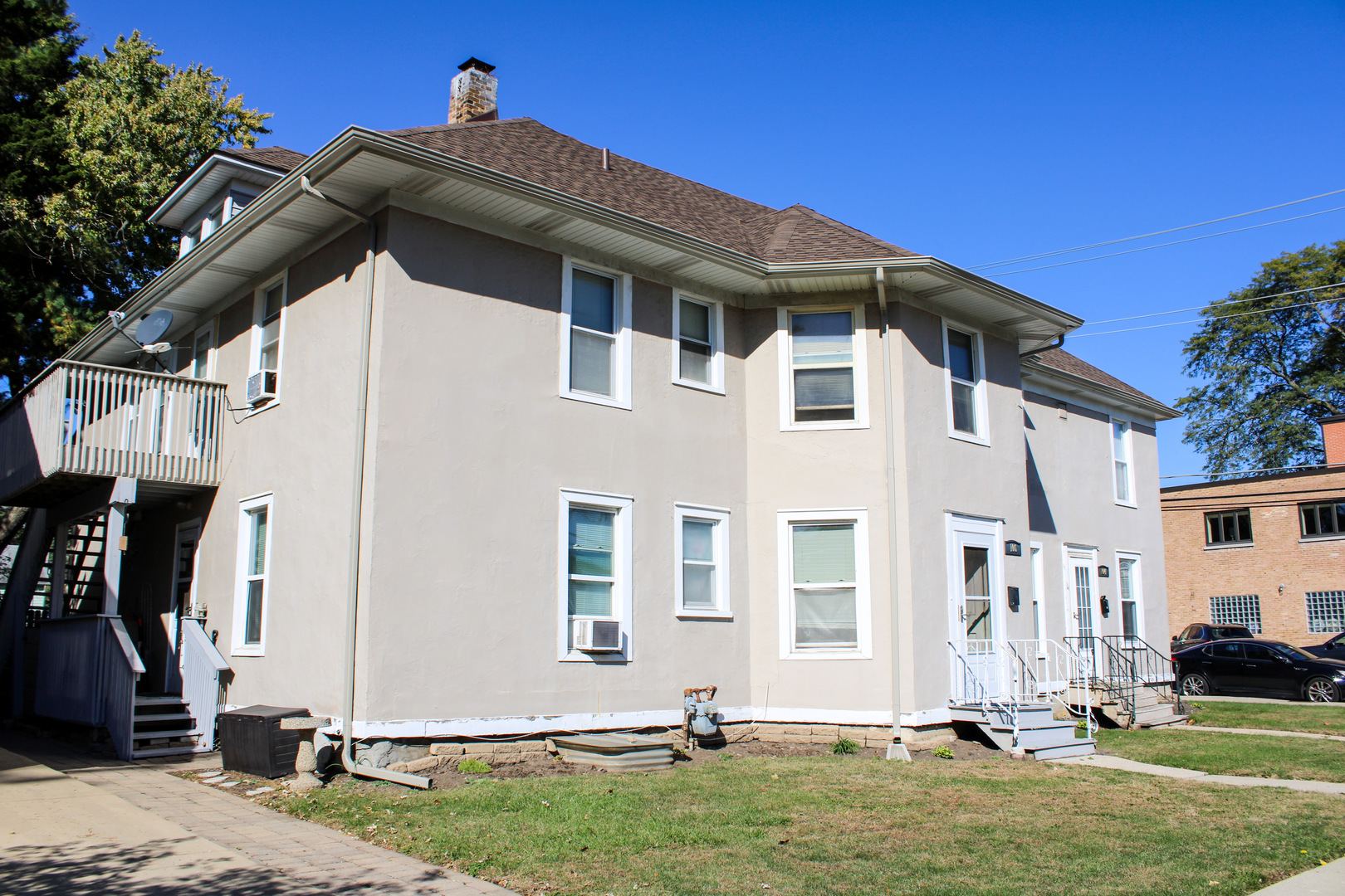 109 Cary Street Cary, IL 60013 - Photo 2 of 21 a front view of a house with a yard