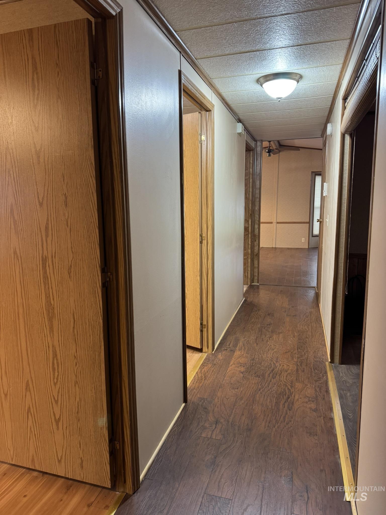 2015 6th Avenue, Unit 308 Clarkston, WA 99403 - Photo 13 of 39 Hall with wood-type flooring
