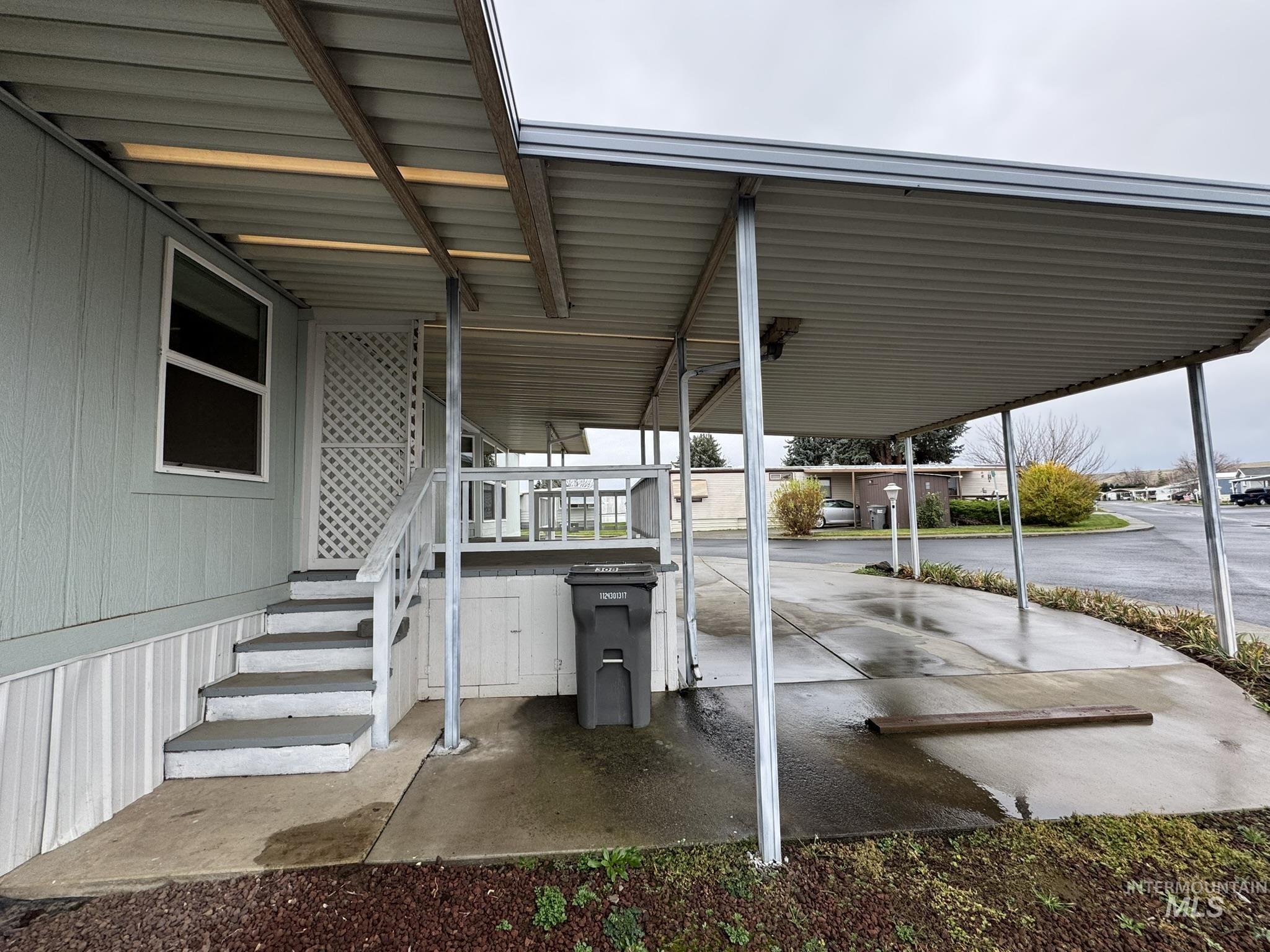 2015 6th Avenue, Unit 308 Clarkston, WA 99403 - Photo 28 of 39 View of patio / terrace featuring an attached carport