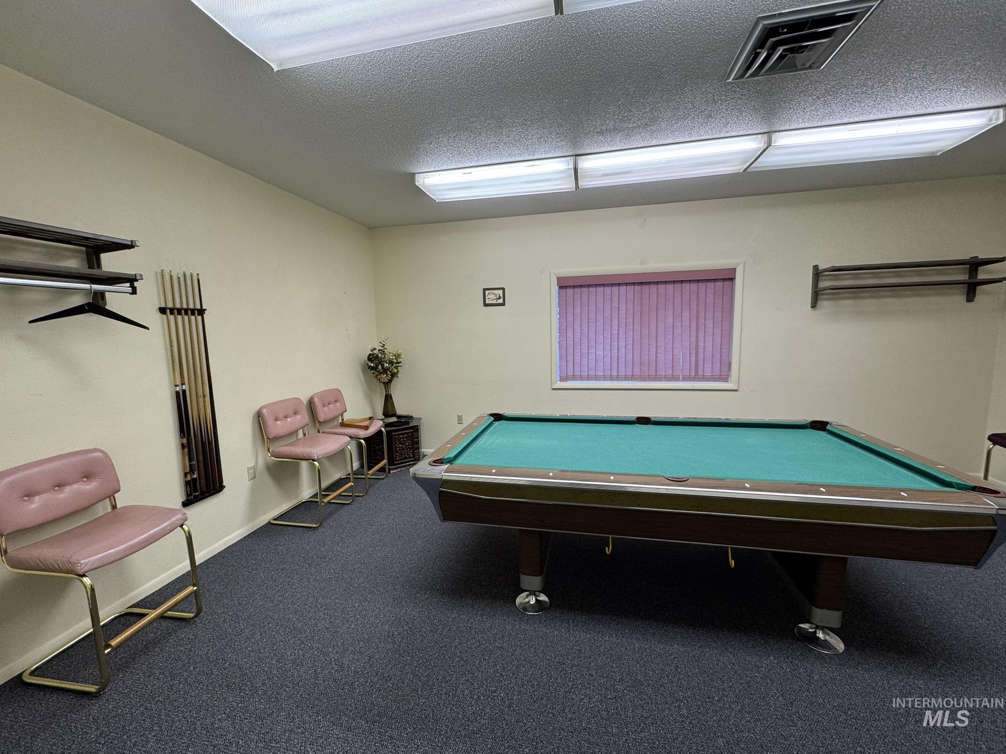 2015 6th Avenue, Unit 308 Clarkston, WA 99403 - Photo 37 of 39 Game room featuring billiards table and a textured ceiling