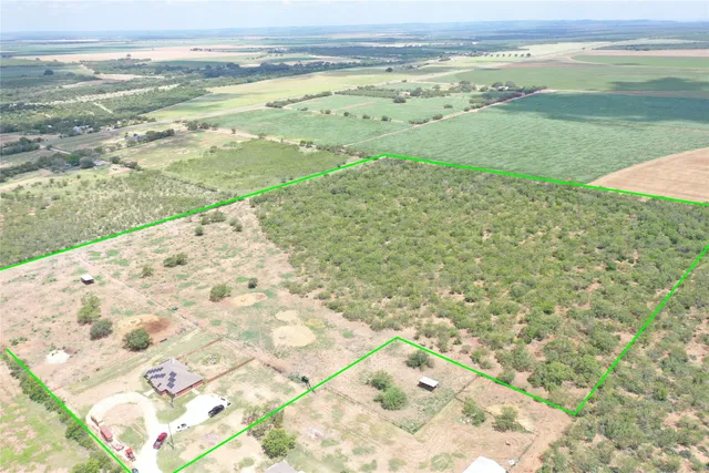 a view of an ocean and a yard