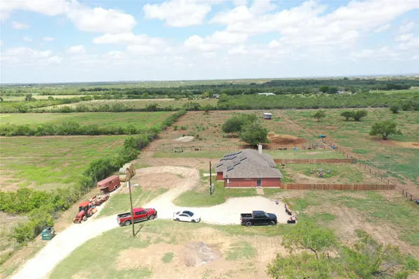 a view of a lake with a car parked