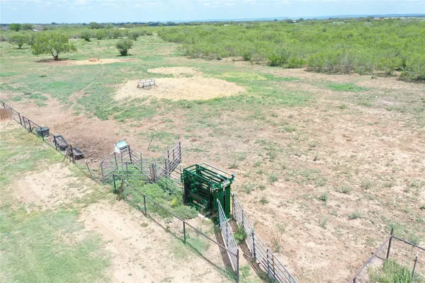 a view of a road with an ocean beach