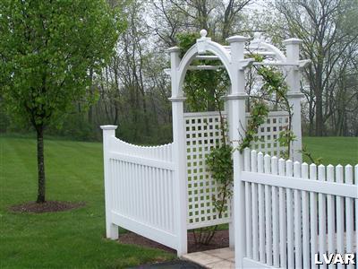 185 West Butternut Road Hellertown, PA 18055 - Photo 11 of 11 a view of a wooden house with a small yard and fence