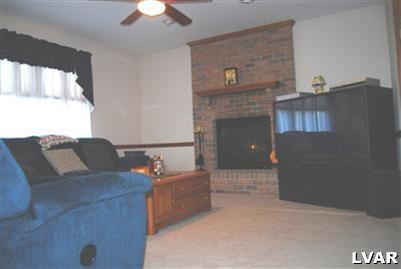 185 West Butternut Road Hellertown, PA 18055 - Photo 5 of 11 a living room with furniture and a fireplace