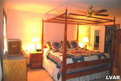 185 West Butternut Road Hellertown, PA 18055 - Photo 6 of 11 a bedroom with furniture and large windows