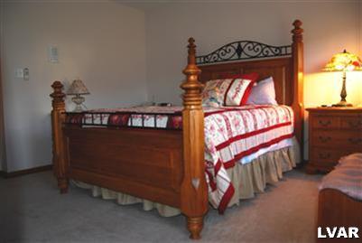 185 West Butternut Road Hellertown, PA 18055 - Photo 7 of 11 a bedroom with a bed and window