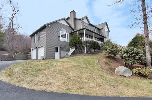 9 Sidney Road Sturbridge, MA 01566 - Photo 2 of 30 a front view of a house with a yard