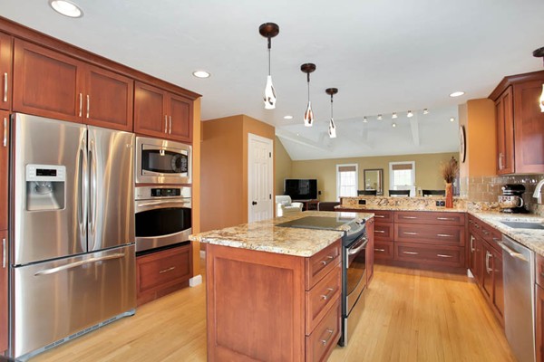 9 Sidney Road Sturbridge, MA 01566 - Photo 10 of 30 a large kitchen with stainless steel appliances granite countertop a sink refrigerator and cabinets