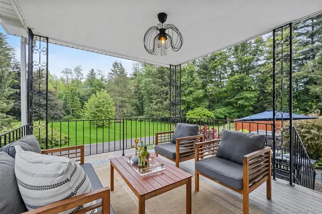 a outdoor living space with furniture and garden view