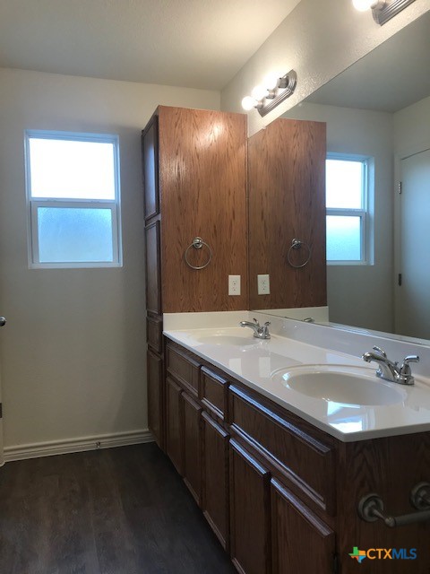 275 Olaf Drive Temple, TX 76504 - Photo 13 of 13 a bathroom with a sink and a mirror