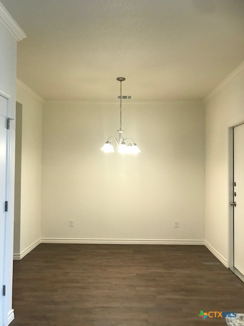 275 Olaf Drive Temple, TX 76504 - Photo 4 of 13 a view of a room with wooden floor and a ceiling fan