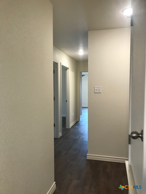 275 Olaf Drive Temple, TX 76504 - Photo 5 of 13 an empty room with wooden floor