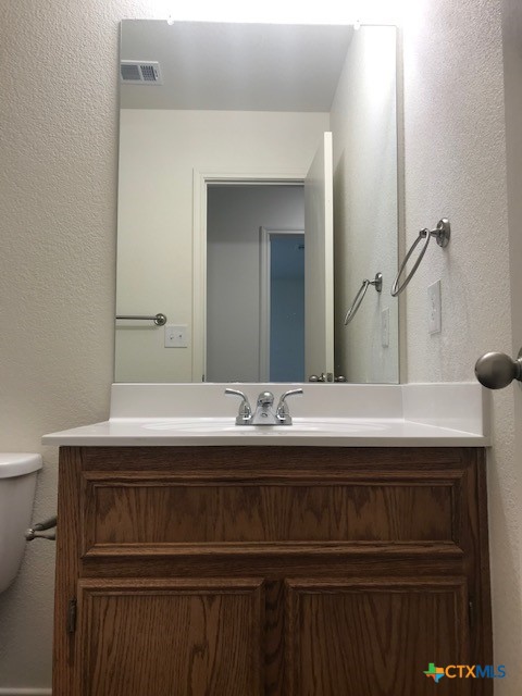 275 Olaf Drive Temple, TX 76504 - Photo 7 of 13 a bathroom with a sink and a mirror