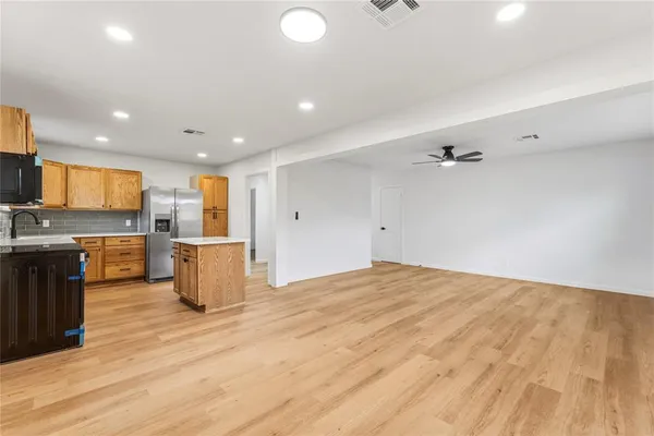 a view of kitchen with sink
