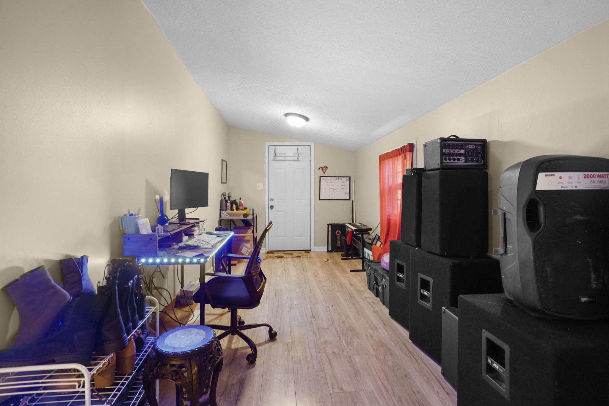 403 Victoria Street Pulaski, TN 38478 - Photo 8 of 21 a view of a workspace with furniture and a flat screen tv