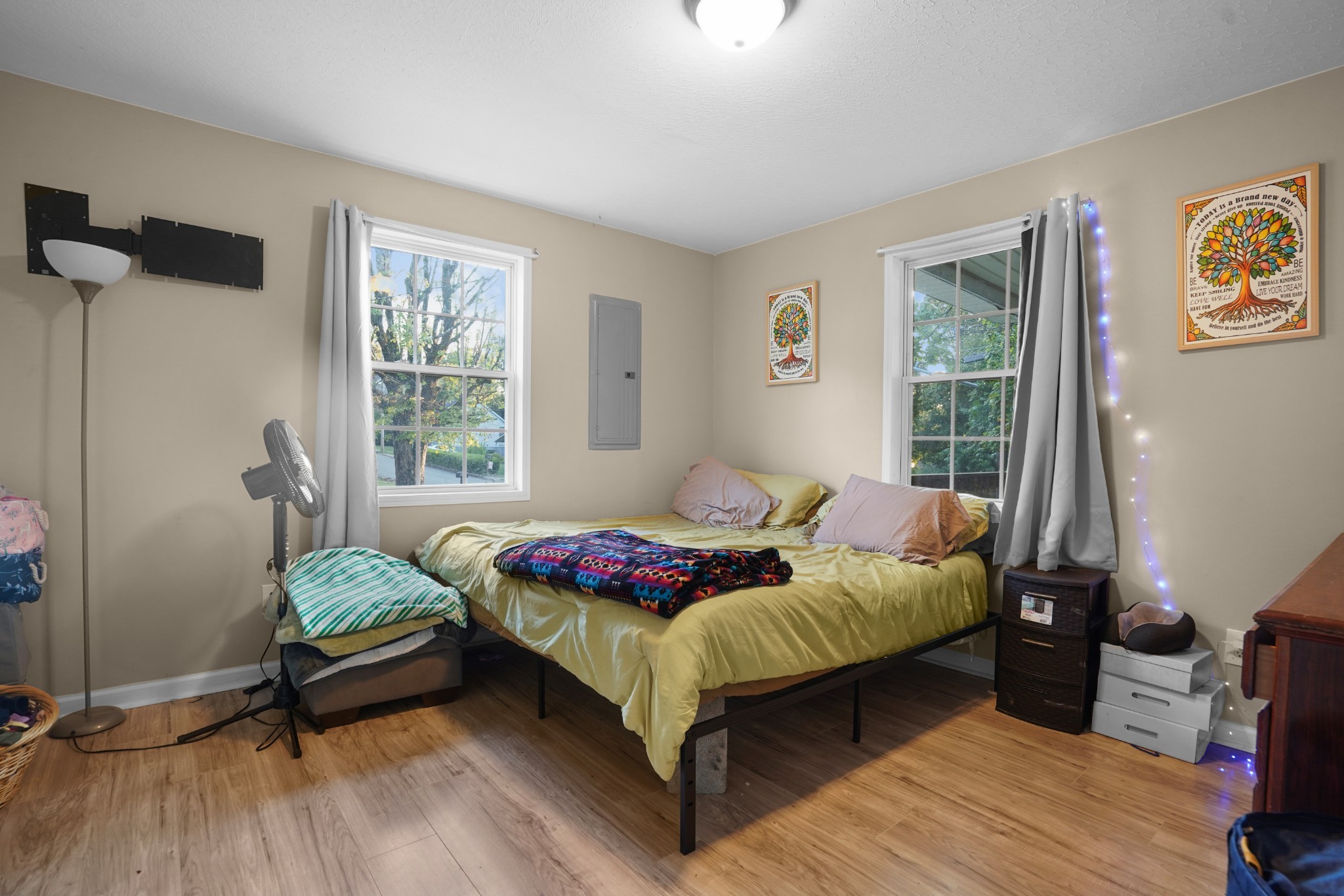 403 Victoria Street Pulaski, TN 38478 - Photo 10 of 21 a bedroom with a bed and wooden floor