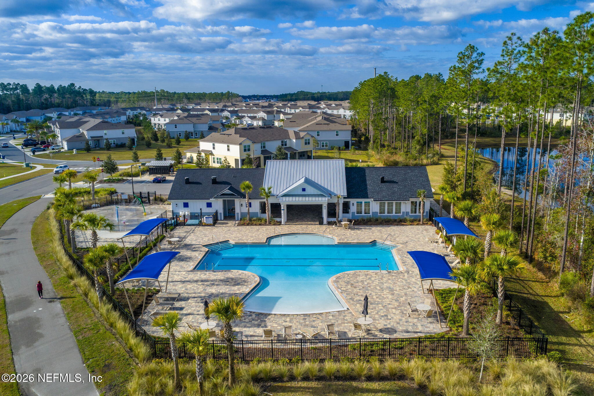 349 Coastline Way Street St. Augustine, FL 32092 - Photo 16 of 16 a view of a swimming pool with outdoor seating