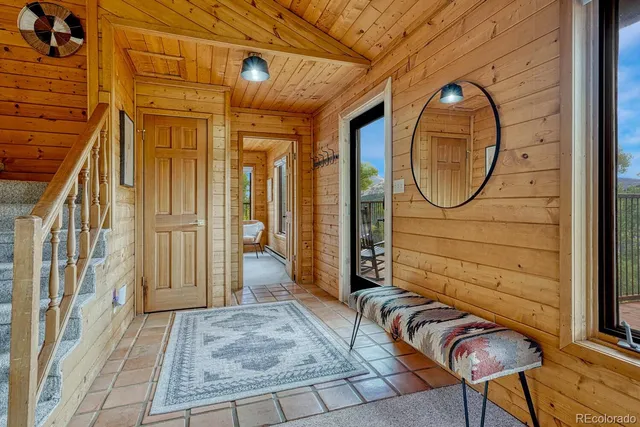 a bedroom with a bed and dresser